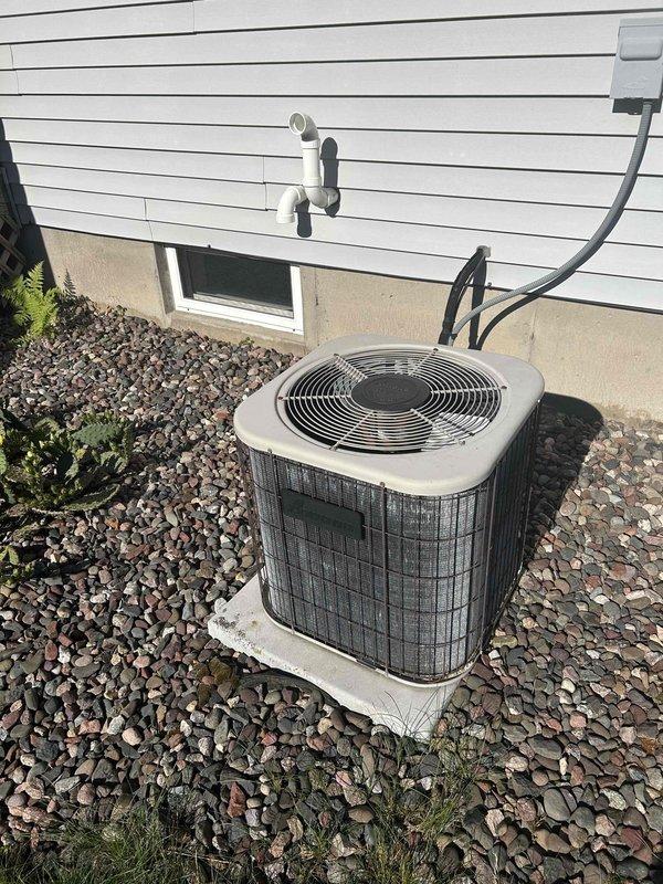 Completed Family Rewards Program cooling maintenance visit on Carrier HVAC system. Performed comprehensive tune-up including cleaning of routine components, testing all electrical and mechanical parts, and inspecting air filter. Verified proper operation of both indoor furnace/air handler unit and outdoor condenser unit, confirming system is running efficiently and ready for continued service.