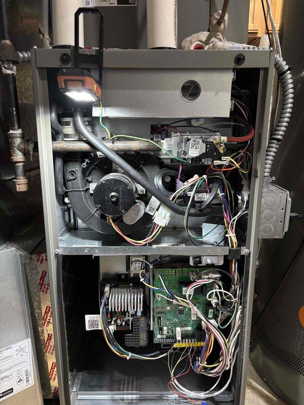 Performed comprehensive AC maintenance on single condenser unit with R-410A refrigerant in 71-degree ambient conditions. Conducted full system inspection including filter, thermostat, temperature split, condenser, coils, motors, capacitors, compressor, refrigerant level, and condensate drain. Identified and resolved low battery condition on Honeywell Home digital thermostat by replacing batteries. Corrected blower speed setting from low to high per factory specifications. All system components tested and verified operating within normal parameters upon completion.