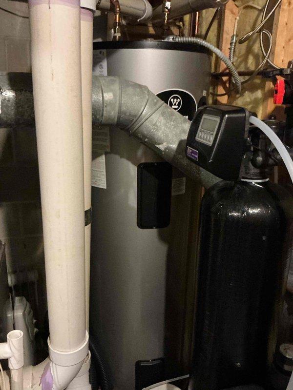 Completed annual cooling maintenance visit on 6-7 year old air conditioning system. Found tripped breaker at electrical panel and heavily built-up evaporator coil restricting airflow. Reset breaker, performed thorough solvent cleaning of coil to restore proper heat transfer and system efficiency, and completed full AC inspection per maintenance agreement protocol.