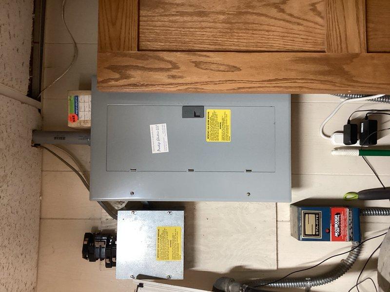 Responded to complaint of salty taste in water and excessive brine level in tank above salt line. Calculated cabinet volume and evaluated existing fill/draw cycle parameters based on 0.2 gpm draw rate and 0.5 gpm fill rate. Adjusted water softener regeneration cycle settings: increased backwash time from 5 minutes to 10 minutes, increased rapid rinse time from 5 minutes to 7 minutes, decreased draw time from 33 minutes to 21 minutes (approximately 4.2 gallons), and decreased fill time from 19 minutes to 7 minutes (approximately 3.5 gallons). Documented equipment with photos.