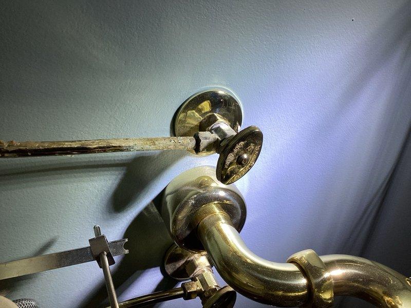 Responded to multiple plumbing issues affecting two bathrooms. Addressed toilet leak causing water damage to downstairs ceiling by installing new toilet with proper wax ring seal and supply line connections. Cleared clogged shower drain in master bathroom affected by significant calcium buildup and mineral deposits. Inspected corroded shower arm assembly showing extensive rust, pitting, and oxidation damage to chrome fixtures. Replaced leaking PEX water supply lines under pedestal sink in half bathroom, installing new shut-off valves and flexible connectors to eliminate leak at connection points. Tested all repairs for proper water flow and verified no active leaks present upon completion.