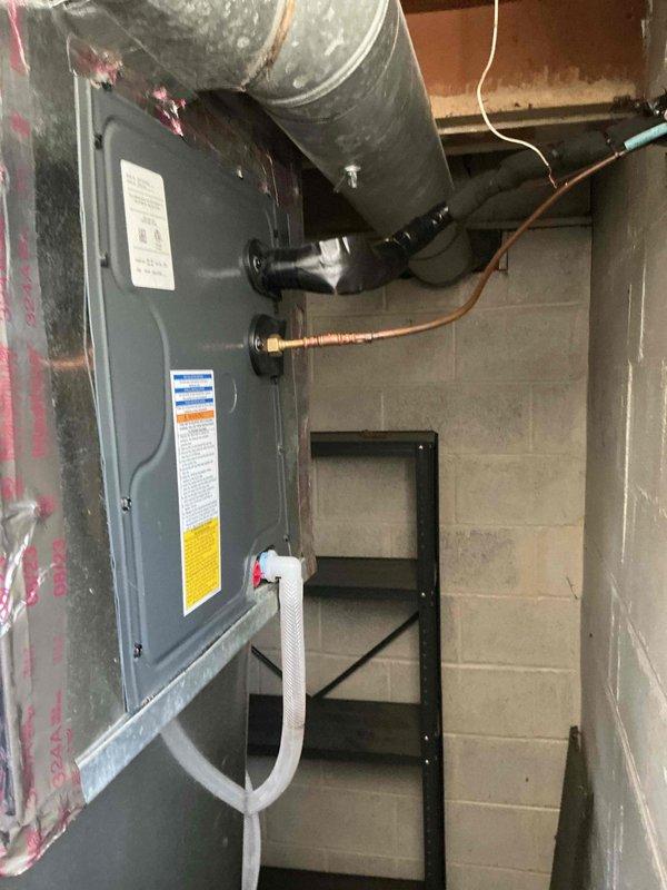 Completed annual air conditioning maintenance tune-up on 2-year-old Goodman system as part of recurring maintenance agreement. Condenser coil had accumulated significant dust and debris buildup, which was thoroughly rinsed and cleaned to restore proper airflow and heat transfer efficiency. System operating within normal parameters with no additional concerns identified at time of service.