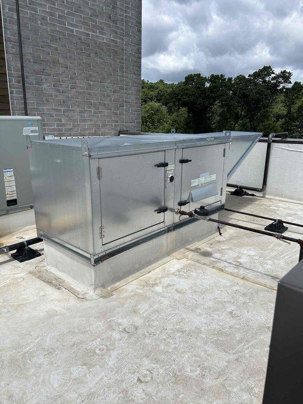 Replaced failed blower motor on rooftop make-up air unit and reset control system. Upon completion, performed full operational testing to verify all components cycled properly and unit returned to normal operation.