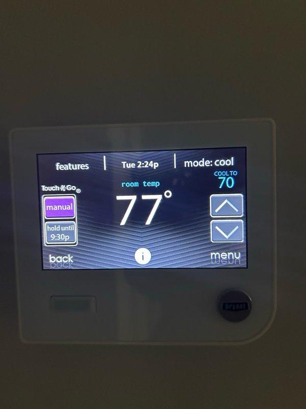 Completed comprehensive air conditioning maintenance inspection per family rewards agreement. Verified and tested all major system components including thermostat operation, air filter condition, blower assembly, outdoor coil cleanliness, electrical connections, contactor, capacitor, condensate drain line, and refrigerant charge levels. Measured temperature split across evaporator coil and confirmed all readings within manufacturer specifications. System operating properly with no mechanical defects or safety concerns identified at time of inspection.