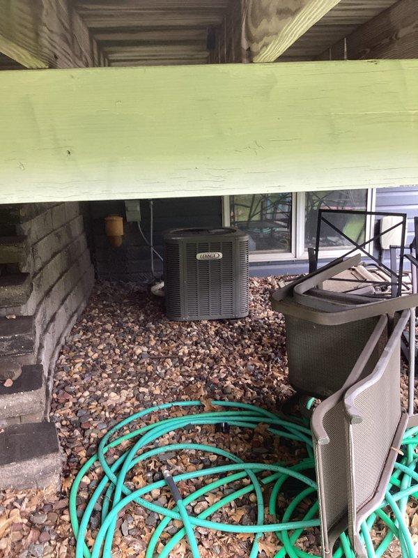 Responded to callback following AC tune-up for persistent odor complaint. Upon inspection, discovered deceased snake inside condenser unit causing foul smell. Removed animal remains and thoroughly cleaned interior of condenser unit, including coils, housing, and surrounding components to eliminate odor and restore proper operation.