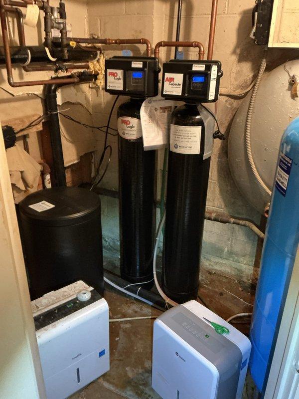 Responded to a leaking toilet complaint and diagnosed multiple issues including a tangled flush chain, failed tank-to-bowl spud gasket and washers, and a malfunctioning flapper valve. Documented the existing conditions and provided a comprehensive replacement bid to address all identified deficiencies causing the water leakage.