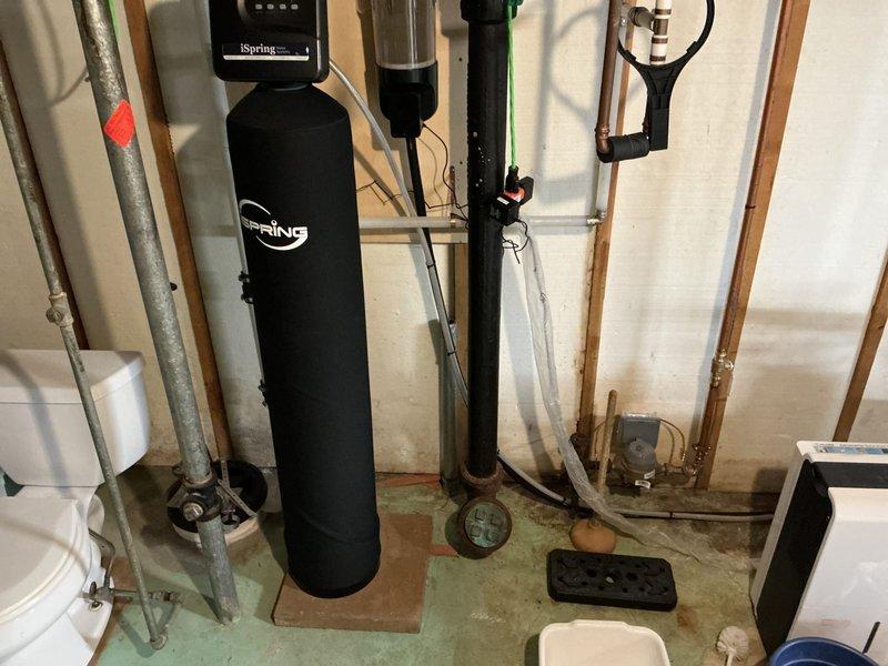 Completed comprehensive plumbing inspection of residential property, including thorough examination of all water supply lines, drainage systems, and plumbing fixtures throughout the house. Hot water tank flushing was intentionally omitted per customer request due to the age of the unit to prevent potential complications. Inspected basement utility area containing iSpring water treatment system, standard water heater, and associated plumbing connections. All water lines, drains, and fixtures were found to be operating properly with no issues identified at this time.