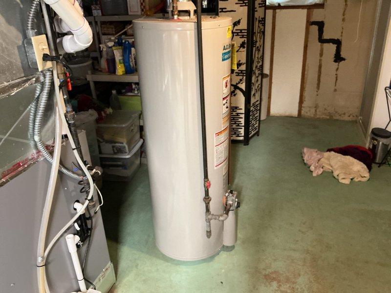 Completed comprehensive plumbing inspection of residential property, including thorough examination of all water supply lines, drainage systems, and plumbing fixtures throughout the house. Hot water tank flushing was intentionally omitted per customer request due to the age of the unit to prevent potential complications. Inspected basement utility area containing iSpring water treatment system, standard water heater, and associated plumbing connections. All water lines, drains, and fixtures were found to be operating properly with no issues identified at this time.