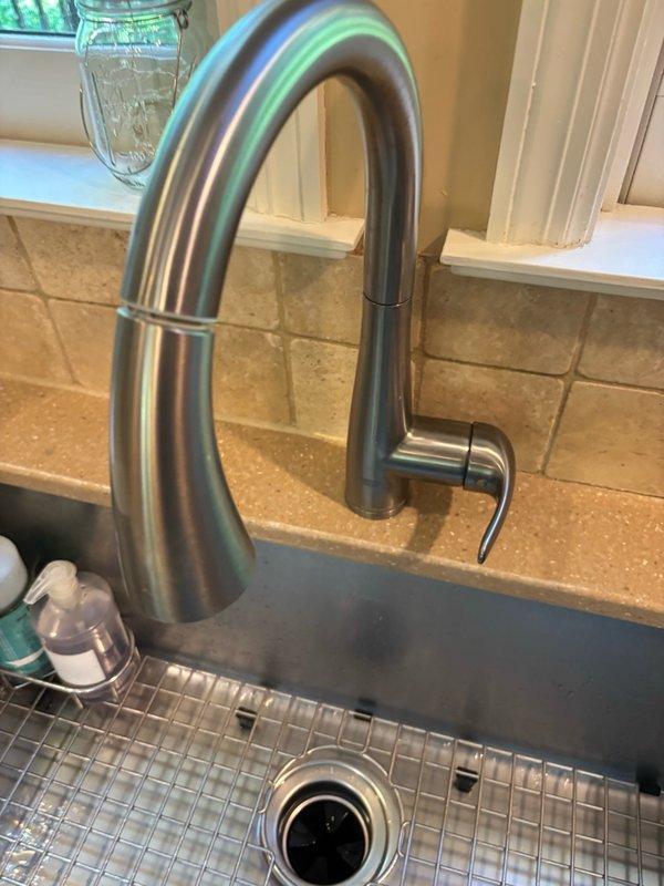 Responded to service call for low water pressure in Grohe kitchen faucet. Disassembled and cleaned aerator, removing debris buildup. Removed and cleaned cartridge, clearing additional debris from internal components. Tested water flow after cleaning both components, but low pressure issue persisted. Diagnosed that internal supply lines or valve body may have additional blockage beyond serviceable components. Discussed repair options with homeowner, who elected to purchase replacement faucet for future installation. Scheduled follow-up appointment for faucet replacement once new fixture is obtained.
