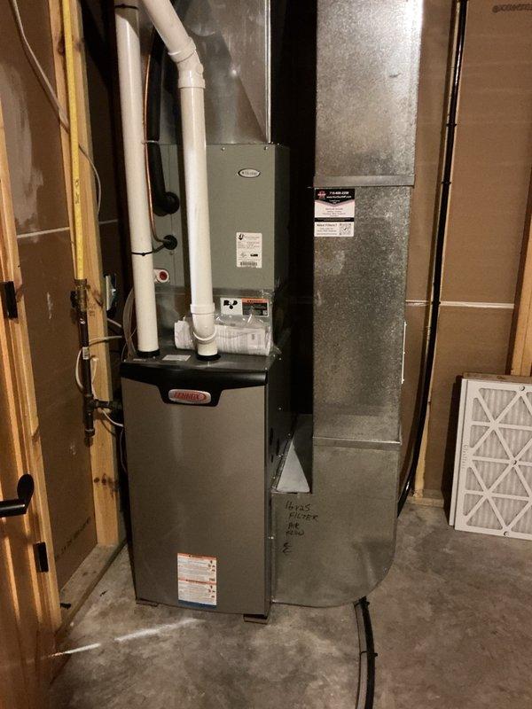 Completed Family Rewards cooling maintenance visit on Lennox HVAC system as part of recurring preventative maintenance agreement. Performed comprehensive air conditioning tune-up inspection prior to property transfer to new owners. Replaced air filter with customer-supplied filter and verified evaporator drain line was flowing properly. Cleaned outdoor condenser coil which showed moderate dirt accumulation. Inspected all electrical connections and components, finding capacitor testing at acceptable levels. System operational check confirmed proper performance with 20-degree temperature split across evaporator coil, indicating adequate cooling capacity and refrigerant charge.