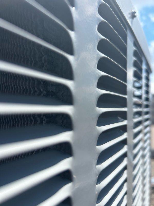 Performed comprehensive AC tune-up on rooftop unit after obtaining roof access from front desk. Conducted thorough maintenance inspection including verification of thermostat operation, 16x20x1 filter condition, blower assembly, outdoor coil cleanliness, electrical components, contactor, capacitor, condensate drain functionality, refrigerant performance, and temperature split measurements. All readings confirmed within normal operating range with no mechanical defects or safety concerns identified. Noted significant rust and corrosion present in electrical disconnect box #125, though system currently operating properly. Recommended continued routine filter changes, maintaining clean indoor and outdoor coils, and scheduling regular preventive maintenance to ensure optimal performance and longevity.
