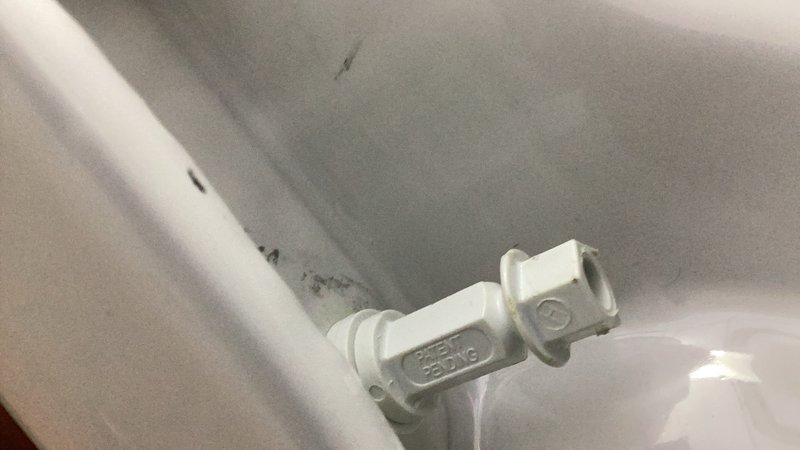 Responded to a toilet leak at the base. Upon inspection, identified a loose tank bolt as the source of the water seepage. Tightened the tank bolt to proper torque specification, resolving the leak and restoring the fixture to normal operation.