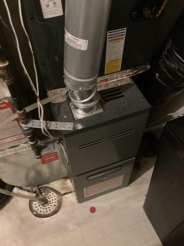 Responded to callback for air conditioning system not turning on. Upon inspection, discovered damaged 2-wire conductor running to condensing unit was shorting out, causing system failure. Replaced damaged section of wiring to restore proper electrical connection. Verified system operation with 21-degree temperature split across evaporator coil, confirming unit is now cooling properly.