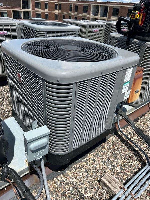 Performed comprehensive AC tune-up on rooftop condensing unit. Conducted thorough maintenance inspection including thermostat operation verification, filter condition assessment (16x16x1), blower assembly examination, outdoor coil inspection, and evaluation of all electrical components including contactor and capacitor. Measured refrigerant performance and temperature split using calibrated instrumentation, with all readings confirming proper system operation within manufacturer specifications. Verified condensate drain functionality and found no mechanical defects or safety concerns. System confirmed operating efficiently with no immediate service needs identified. Recommended continued regular filter replacement and coil maintenance to sustain optimal performance and equipment longevity.