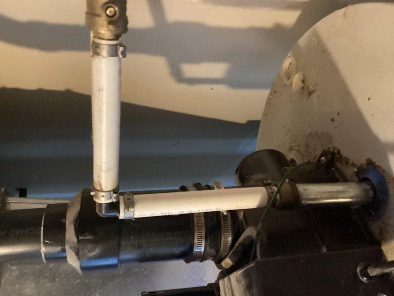 Responded to no hot water complaint and diagnosed failed water heater blower motor preventing proper combustion and ignition. Pilot light would not stay lit due to blower assembly failure. Inspected tank condition, water connections, gas supply lines, and venting system. Found unit beyond economical repair given age and component failure. Provided estimate for complete water heater replacement including new tank, installation labor, and necessary fittings and flex connectors to bring installation up to current code requirements.