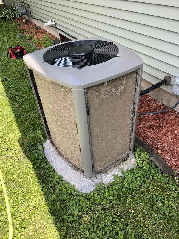 Completed comprehensive BOGO tune-up service on residential AC and furnace system. Performed full inspection of outdoor condenser unit, thoroughly washed exterior cabinet and coils to remove accumulated dirt and debris, and verified all electrical components reading within manufacturer specifications. Inspected indoor furnace system, confirmed air filter in good condition, tested all electrical connections and readings within proper parameters, cleared condensate drain hoses, and cleaned flame sensor to ensure optimal ignition performance. Both heating and cooling systems operating properly with no deficiencies noted at time of service completion.