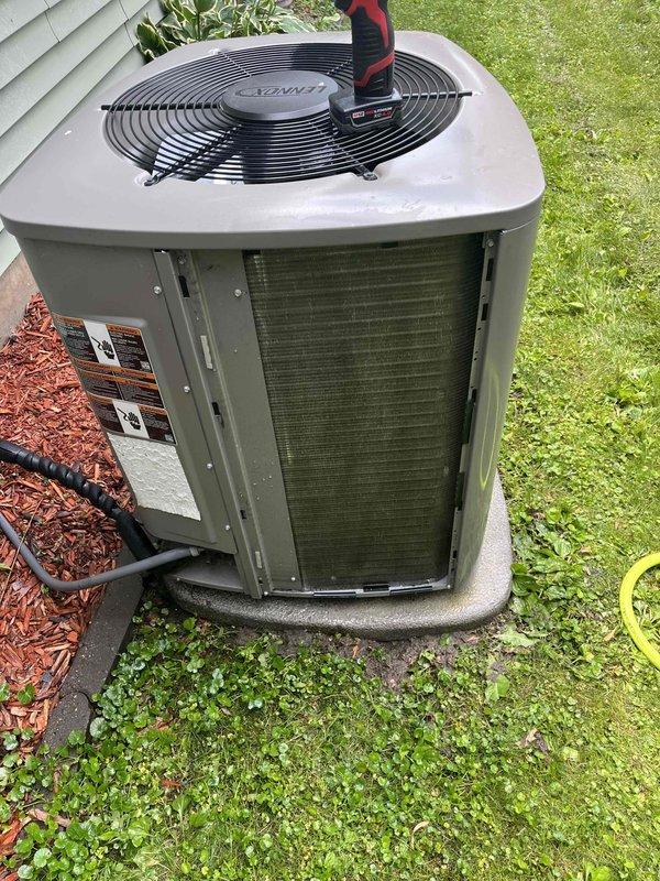 Completed comprehensive BOGO tune-up service on residential AC and furnace system. Performed full inspection of outdoor condenser unit, thoroughly washed exterior cabinet and coils to remove accumulated dirt and debris, and verified all electrical components reading within manufacturer specifications. Inspected indoor furnace system, confirmed air filter in good condition, tested all electrical connections and readings within proper parameters, cleared condensate drain hoses, and cleaned flame sensor to ensure optimal ignition performance. Both heating and cooling systems operating properly with no deficiencies noted at time of service completion.