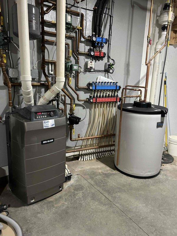 Responded to no cooling complaint on four-year-old system originally installed by our company. Previous contractor had identified low refrigerant charge but declined to service due to warranty concerns. Connected manifold gauges to outdoor condenser unit and confirmed system was operating with insufficient refrigerant charge. Reviewed warranty coverage details and available repair options with homeowner. Recharged AC system to proper operating levels and injected UV leak detection dye into refrigerant circuit to facilitate future leak identification if issue recurs. Verified unit returned to normal cooling operation before departure. System cooling properly upon completion.