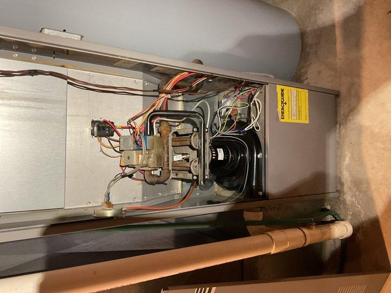 Responded to no-heat call on 1988 furnace system. Upon arrival, diagnosed failed 24V control transformer caused by customer accidentally shorting low-voltage wires at outdoor condenser contactor. Replaced defective control transformer and installed inline fuse on R terminal/24V secondary circuit to provide future overcurrent protection for low-voltage system. Cycled and tested both furnace and air conditioning systems to verify proper operation. Confirmed furnace blower motor operation, condenser contactor engagement, heating cycle functionality, and airflow delivery. System restored to full operational status with both heating and cooling modes functioning properly.
