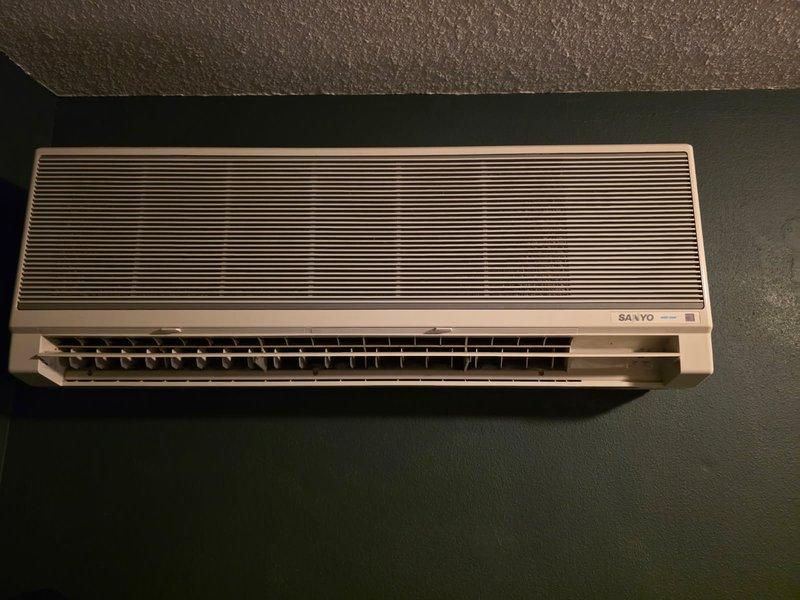 Responded to no cooling complaint on Sanyo ductless mini-split system. Upon inspection, found unit running but not cooling effectively. Performed diagnostic testing and discovered refrigerant charge at zero—system completely flat. Identified system uses R-22 refrigerant, which is phased out and increasingly expensive. Due to total refrigerant loss indicating significant leak and obsolete refrigerant type, recommended system replacement rather than repair. Scheduled follow-up appointment for equipment replacement estimate.