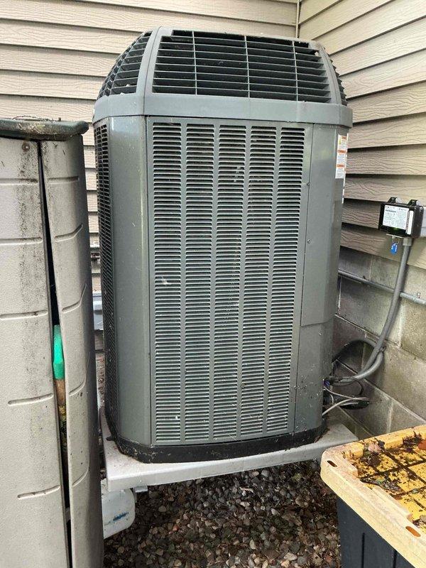 Completed annual cooling maintenance on 16-year-old TRANE air conditioning system. Performed comprehensive inspection of all major components including capacitor, contactor, and control board—all found to be in good working condition. Verified refrigerant charge within manufacturer specifications. Measured temperature drop across evaporator coil at 19°, which is within acceptable range. Confirmed evaporator coil is clean and filters are in good condition.

Identified several concerns during inspection: condenser coil shows dirt accumulation but presents cleaning challenges due to accessibility issues; compressor exhibiting abnormal sounds indicating potential wear; heat exchanger showing signs of deterioration with holes forming at burner ports. Documented findings with photographs of outdoor condenser unit and internal furnace components including heat exchanger condition. Reviewed all available options with customer and scheduled follow-up consultation with service advisor to discuss