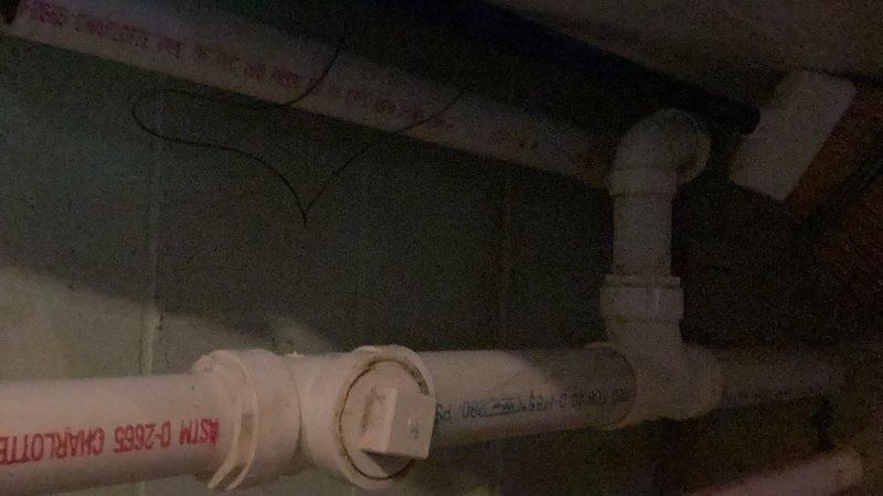 Completed comprehensive plumbing inspection of residential property as part of friends and family program. Evaluated all plumbing fixtures and systems, including bathroom facilities, drainage infrastructure, and under-sink connections. Documented existing conditions with photographic evidence showing traditional three-piece faucet assembly with oil-rubbed bronze finish, white PVC drain-waste-vent piping system with standard residential fittings, and overall plumbing configuration. Identified older Mansfield toilets throughout property and recommended replacement due to age and potential efficiency concerns. All accessible plumbing components inspected and findings communicated for future maintenance planning.