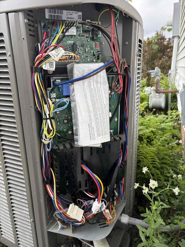 Completed comprehensive AC maintenance on one 3-year-old condenser unit utilizing R-410A refrigerant under 60-degree ambient conditions. Performed full system inspection including filter evaluation, thermostat operation verification, temperature split measurement, condenser and coil examination, motor and capacitor testing, compressor assessment, refrigerant level check, and condensate drain inspection. Accessed interior electrical and control components, inspecting dual circuit boards, wiring connections, and all internal systems. Noted minor debris accumulation on exterior coil fins but system demonstrated normal operational parameters across all tested components with no deficiencies requiring immediate attention.