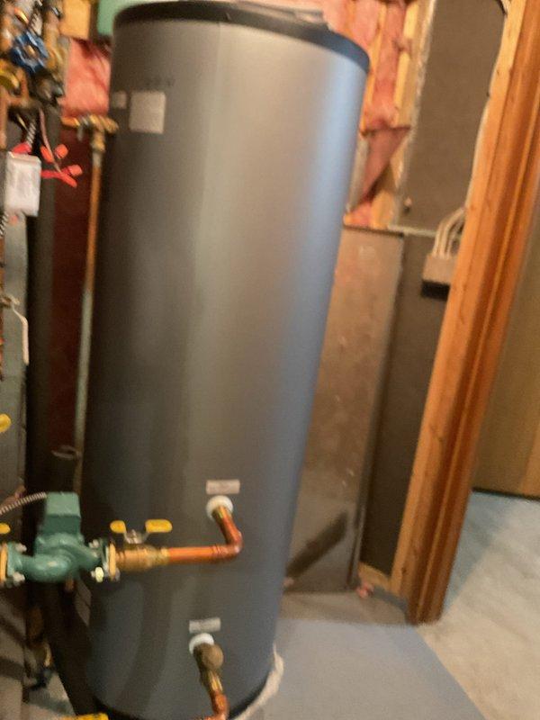 Completed comprehensive maintenance service on two air conditioning systems and one IBC boiler as part of annual membership agreement. Performed boiler maintenance including heat exchanger access and cleaning, flame sensor cleaning, condensate flush, and operational verification. Serviced primary residential AC unit with evaporator pan condensate flush, blower capacitor inspection, outdoor coil washing, and component verification, achieving 22° temperature split across the coil. Serviced secondary AC unit located in shed with condensate system flush, outdoor coil washing, and full component inspection, recording 21° temperature split. All equipment operating within normal parameters with no deficiencies identified.
