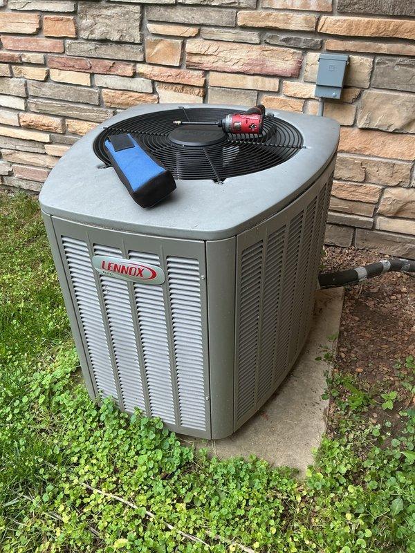 Completed comprehensive maintenance service on two air conditioning systems and one IBC boiler as part of annual membership agreement. Performed boiler maintenance including heat exchanger access and cleaning, flame sensor cleaning, condensate flush, and operational verification. Serviced primary residential AC unit with evaporator pan condensate flush, blower capacitor inspection, outdoor coil washing, and component verification, achieving 22° temperature split across the coil. Serviced secondary AC unit located in shed with condensate system flush, outdoor coil washing, and full component inspection, recording 21° temperature split. All equipment operating within normal parameters with no deficiencies identified.
