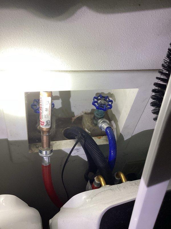 Completed comprehensive plumbing inspection as part of friends and family service program. Inspected all accessible plumbing fixtures and components including bathroom sink with dual-handle chrome faucet, water heater supply valves with braided flex lines, and shut-off valve assemblies. All fixtures confirmed operational with no leaks, drainage issues, or functional concerns reported. Minor surface corrosion noted on valve mounting hardware but does not affect operation. All systems verified in proper working order with no immediate repairs required.