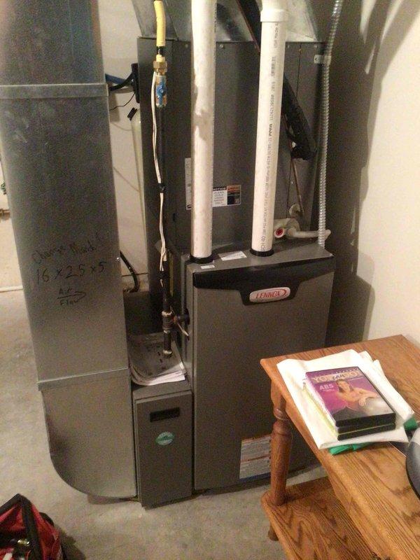 Performed annual AC tune-up on Lennox system per maintenance agreement. Washed outdoor condenser unit, tested all electrical components confirming proper voltage and amperage within manufacturer specifications, and verified 20-degree temperature split across evaporator coil. Inspected air filter which remains in serviceable condition but will require replacement prior to heating season.