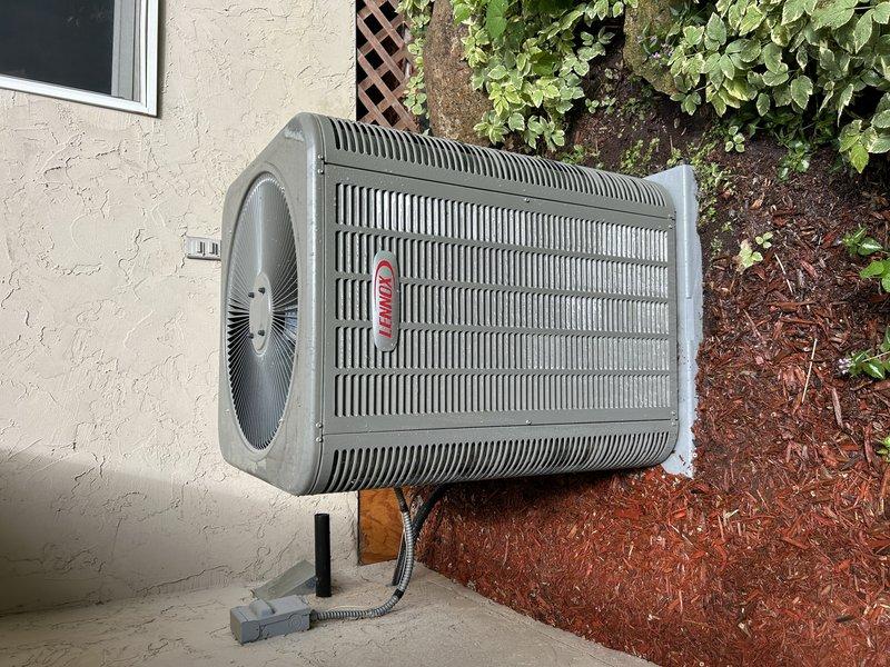 Responded to service call for 1-year-old Lennox AC unit reporting loud jet-like noise and lack of cooling. Upon arrival, inspected outdoor condensing unit and determined noise was likely caused by debris that had fallen into fan assembly during operation. Verified system operation, confirmed adequate cooling performance, and found no mechanical defects or required repairs. Addressed homeowner questions regarding thermostat operation and confirmed unit is functioning properly under 10-year parts and 5-year labor warranty coverage.