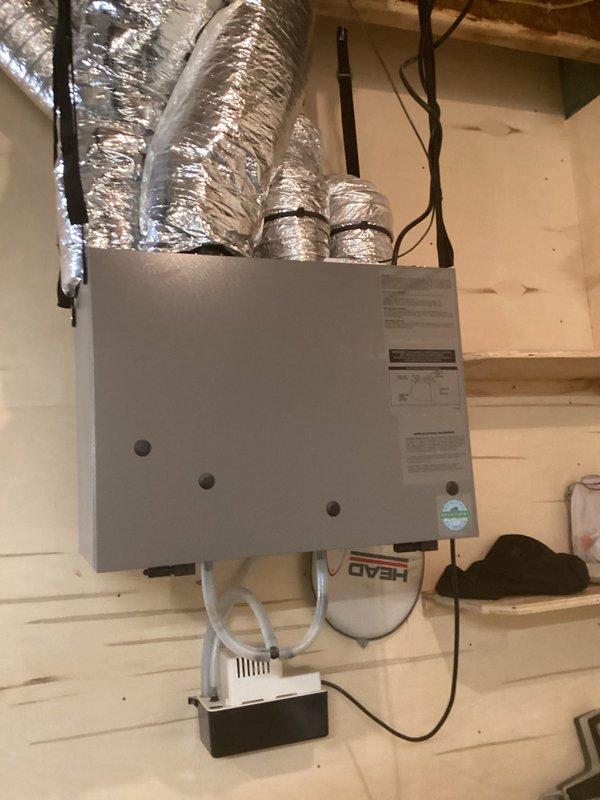 Performed annual air conditioning maintenance and tune-up on approximately 9-year-old HVAC system. Conducted comprehensive system inspection including refrigerant pressure testing using digital manifold gauges, which showed proper operating pressures and temperatures. Inspected air handler unit, ductwork connections, condensate drain lines, and electrical connections. All components operating within normal parameters with no deficiencies identified. System functioning properly with no repairs required.