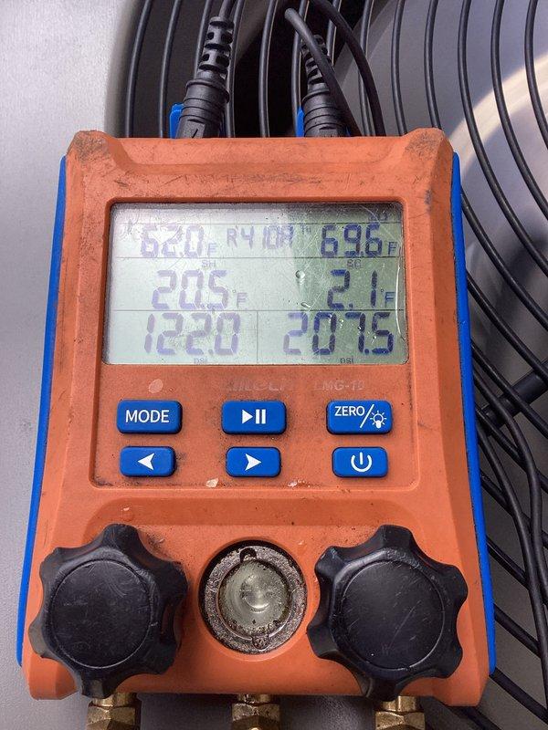 Performed annual air conditioning maintenance and tune-up on approximately 9-year-old HVAC system. Conducted comprehensive system inspection including refrigerant pressure testing using digital manifold gauges, which showed proper operating pressures and temperatures. Inspected air handler unit, ductwork connections, condensate drain lines, and electrical connections. All components operating within normal parameters with no deficiencies identified. System functioning properly with no repairs required.
