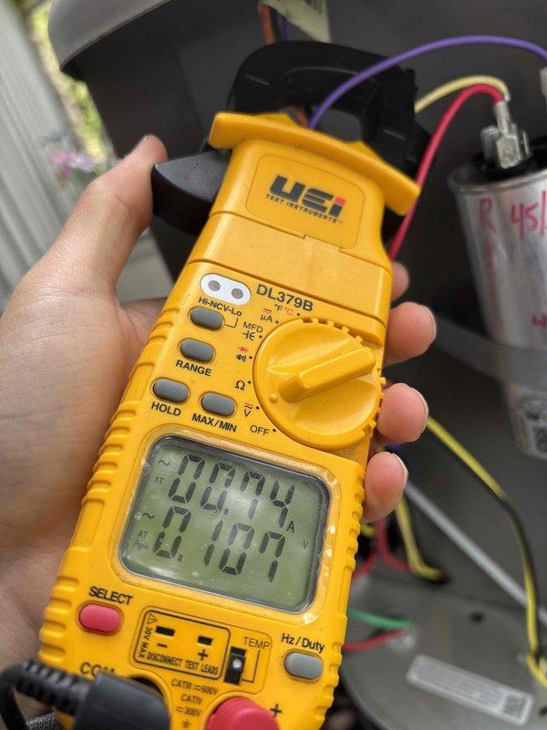 Performed comprehensive AC maintenance on one R-410A condensing unit with no reported issues. Conducted full system inspection including air filter, Honeywell thermostat operation, temperature split measurements, condenser coil condition, evaporator coil, blower motor, capacitor testing with multimeter, compressor amperage draw, refrigerant charge level, and condensate drain line. All components tested within normal operating parameters at 65-degree ambient temperature, and system is cooling properly.