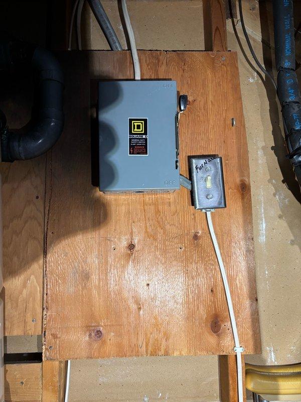 Performed annual A/C maintenance on a 2022 Lennox furnace and condenser system. Removed access panels, cleaned condenser coil, and verified run capacitor is operating within manufacturer specifications. Identified legacy component from previous Lennox Pulse system installation—combustion-air intake muffler remains attached to current PVC intake piping. All equipment operating normally with no functional issues detected. Recommend evaluation and removal of old Pulse muffler/adapter assembly if not required for current furnace venting design, as insufficient PVC materials were available on-site to complete replacement at this time.