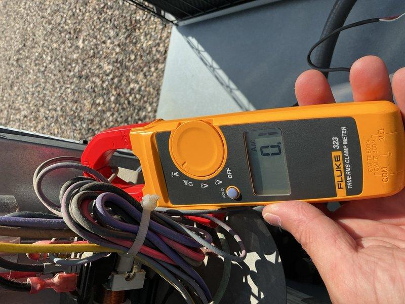Completed comprehensive AC tune-up on rooftop unit, accessing system with key obtained from front desk. Replaced 20x20x1 air filter and verified blower speeds operating within normal parameters. Performed full inspection of rooftop condensing unit including capacitor, contactor, electrical wiring, and refrigerant levels—all components tested and confirmed in good working condition with no issues found.