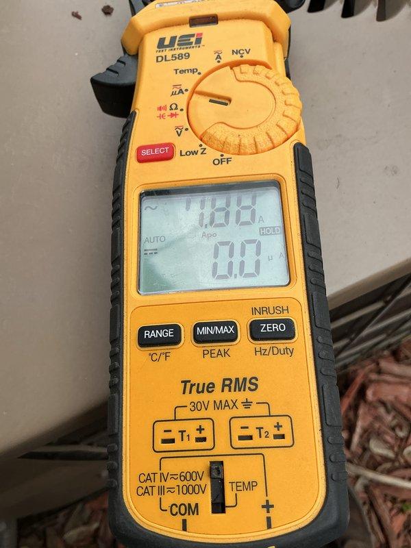Completed comprehensive air conditioning maintenance on aging system approximately 30-40 years old. Inspected and tested all major components including contactor, which showed significant wear, and verified dual capacitor that had been previously replaced. Measured compressor amperage at 1.88A using digital multimeter to assess system performance. Inspected attic-mounted air handler, ductwork, and condensate drainage system. Noted newer furnace installation in contrast to aging AC components. System operational at time of service completion, though advanced age and worn contactor condition were documented for property disclosure purposes.