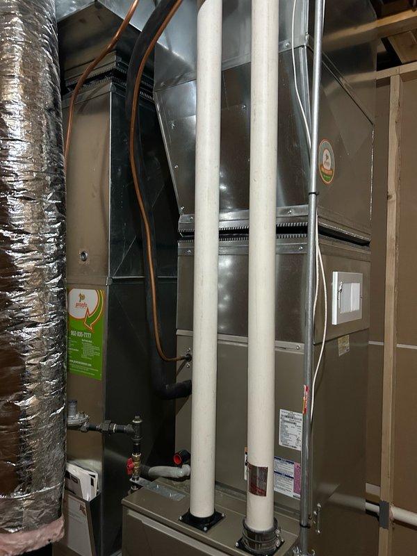 Performed Family Rewards cooling maintenance visit on 12-year-old residential AC system. Discovered confirmed refrigerant leak with system operating at low pressure, resulting in inefficient cooling. Compressor amperage measured at 70.5A, exceeding nameplate RLA of 64.0A, indicating overload condition. Inspected capacitor and contactor during tune-up. Provided homeowner with repair estimate and scheduled comfort advisor visit for July 1 to assess repair versus replacement options.