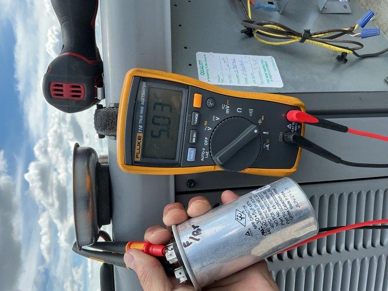 Completed comprehensive AC tune-up on 4-year-old rooftop unit accessed via front desk key. Performed full system inspection including 16x20x1 air filter evaluation, blower speed verification, capacitor testing with multimeter, contactor examination, electrical wiring inspection, and refrigerant level assessment. All components found operating within normal parameters with no deficiencies identified; system functioning properly.