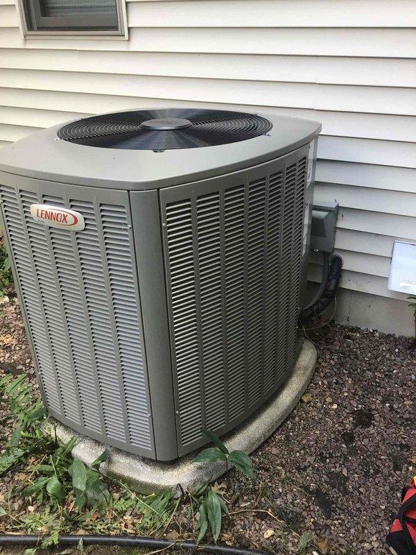 Responded to no cooling complaint on Lennox air conditioning system less than 10 years old displaying service urgent alarm ID 31. Upon inspection, discovered severely restricted airflow due to extremely dirty air filter that had not been changed since original installation date. Located and repaired loose electrical wire connection that was contributing to system fault and intermittent operation. Advised homeowner to replace air filter immediately and recommended installing protective barrier fencing around outdoor condensing unit to prevent animal interference, as dogs were observed chasing wildlife around equipment which could cause damage to components or refrigerant lines.