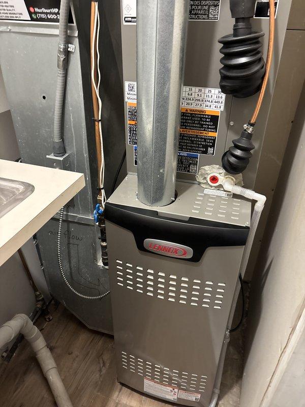 Completed install follow-up warranty visit to verify system charge on recently installed Lennox HVAC system. Initial installation could not be charged due to cold ambient temperatures and unknown lineset length running through ceiling. Upon return visit, performed refrigerant charge verification and system operational testing. Confirmed air conditioning system operating within manufacturer specifications with proper refrigerant levels and all components functioning correctly.