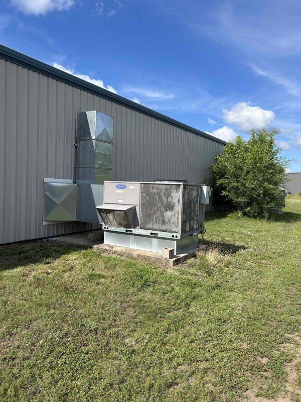 Completed compressor replacement on commercial Carrier rooftop unit circuit #2. Replaced failed 3.5-5 ton 3-phase compressor rated for R-410A refrigerant, along with filter drier, contactor, and compressor terminal. Recovered existing refrigerant from system, evacuated to proper vacuum levels, and recharged unit with 9 pounds 12 ounces of R-410A. Performed operational testing to verify proper system function and confirm successful repair.
