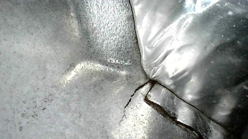 Completed annual cooling tune-up on residential AC system, which included comprehensive inspection and testing of all components. During inspection, identified a cracked heat exchanger requiring attention, with comfort advisor scheduled for follow-up consultation. System verified to be running normally with proper cooling operation, and thermostat confirmed functioning correctly at setpoint of 70°F in cooling mode.