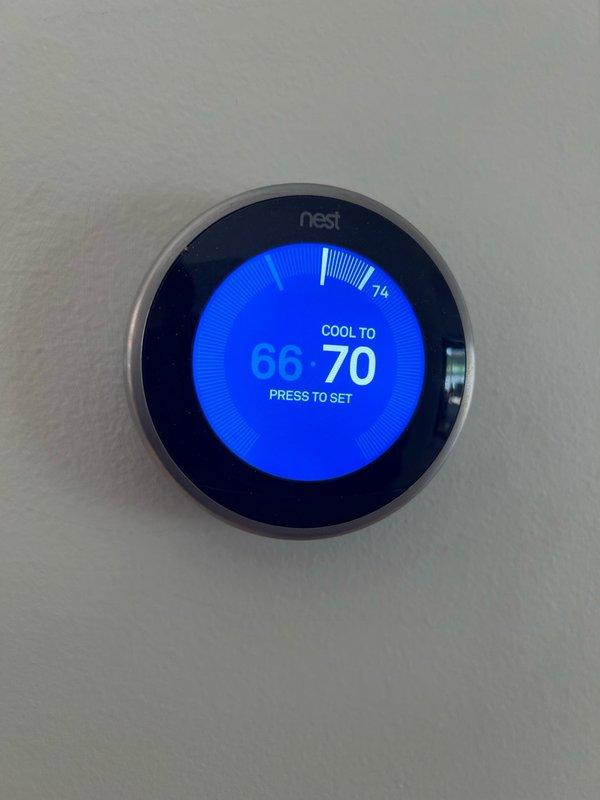 Completed annual cooling tune-up on residential AC system, which included comprehensive inspection and testing of all components. During inspection, identified a cracked heat exchanger requiring attention, with comfort advisor scheduled for follow-up consultation. System verified to be running normally with proper cooling operation, and thermostat confirmed functioning correctly at setpoint of 70°F in cooling mode.