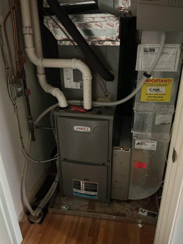 Responded to no cooling complaint on Lennox system installed in 2023. Upon arrival, verified all refrigerant pressures were within normal operating range, contrary to previous service provider's assessment of low refrigerant. Inspection revealed heavily soiled condenser coil restricting airflow and reducing heat transfer efficiency. Performed thorough condenser coil cleaning to restore proper system operation and cooling capacity.