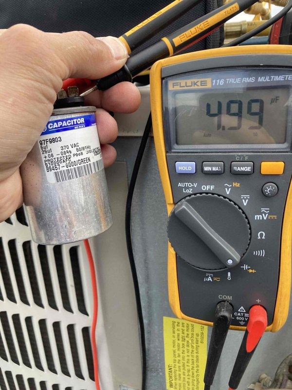 Performed comprehensive tune-up on rooftop air conditioning system. Tested capacitor functionality using multimeter, confirming proper microfarad readings within manufacturer specifications. Measured electrical amperage draw with clamp meter to verify compressor and system components operating at correct parameters. All system components inspected and found operating properly with no deficiencies noted.