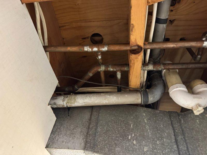 Responded to plumbing issue in basement bathroom where shower controls were failing due to age and possible corrosion. The existing Moen shower faucet was difficult to operate, with the handle requiring excessive force to pull. Diagnosed worn cartridge as the source of the problem. Replaced the Moen cartridge with new unit, restoring smooth operation to the shower valve. Tested hot and cold water flow to ensure proper function. Fixture now operates correctly with normal effort required for temperature and flow control.