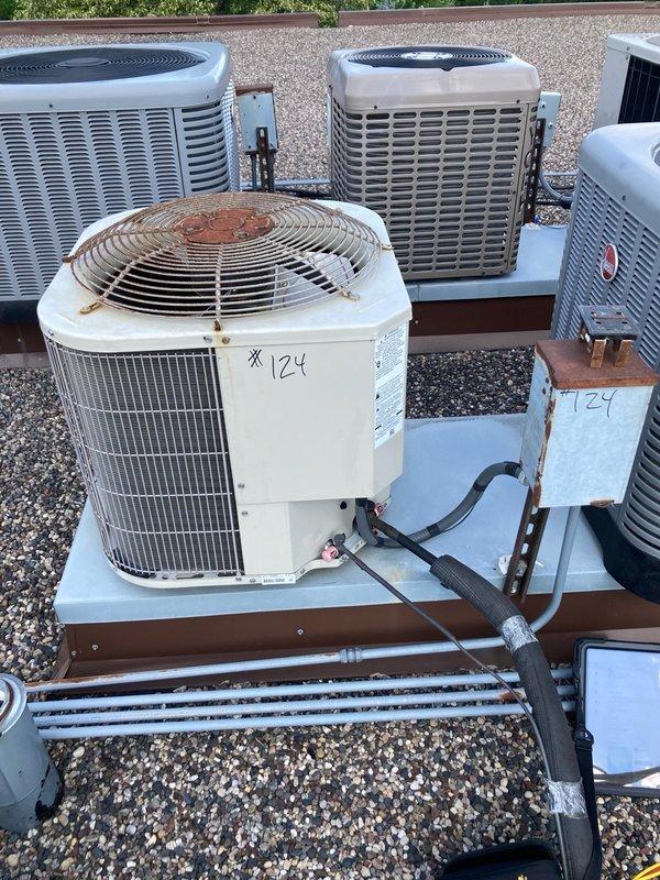 Completed comprehensive AC tune-up on 6-year-old rooftop unit #124. Performed full system inspection including blower motor, capacitor, contactor, electrical wiring, and refrigerant levels—all components found to be in good working condition. Identified filter size as 13x21.5x1 for customer to order independently, and confirmed system is operating properly and ready for summer cooling season.