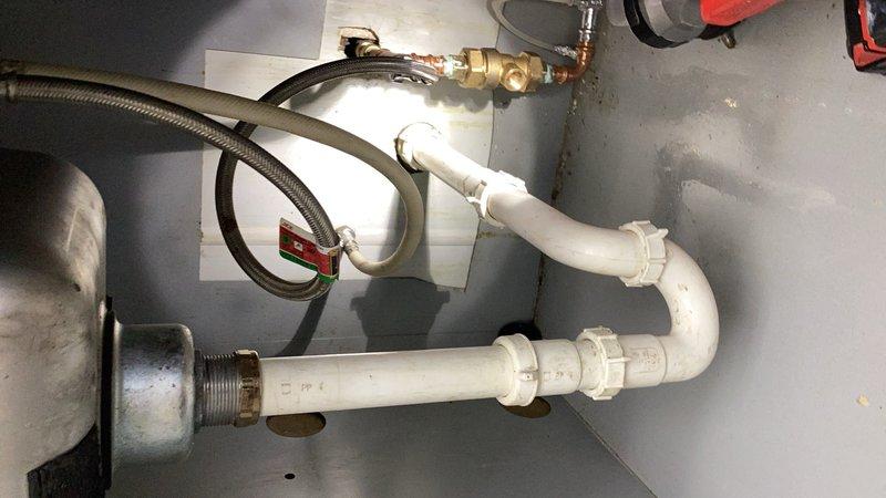 Responded to a standby call for a clogged hand wash sink at a commercial facility. Upon arrival, assessed the stainless steel sink and determined the drain line was obstructed. Successfully snaked the drain line to clear the blockage and restore proper drainage function.
